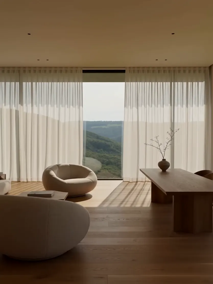 AI video generator interior design showcase of a sunlit glass house overlooking a green valley